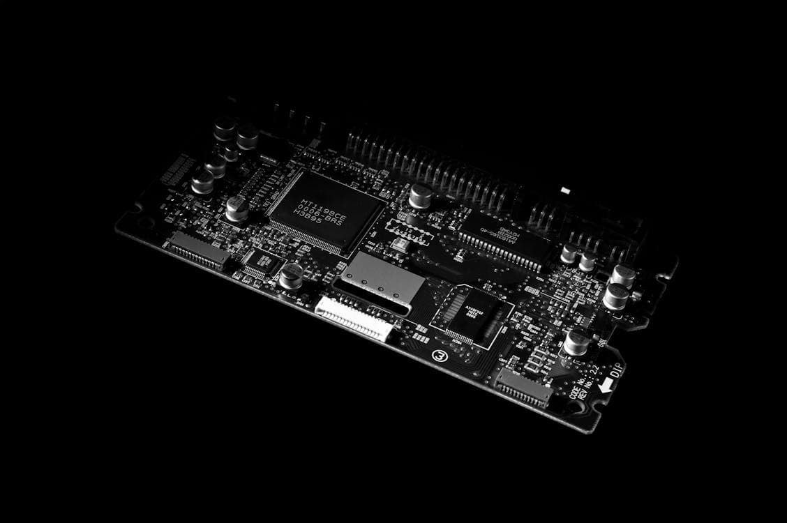 Close-up of a circuit board chip representing AI technology