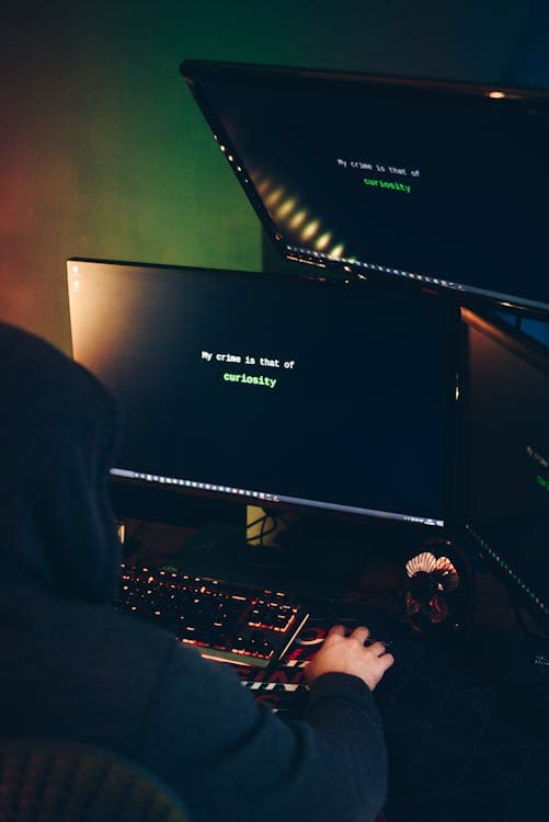 Cyber security professional working in a dark room